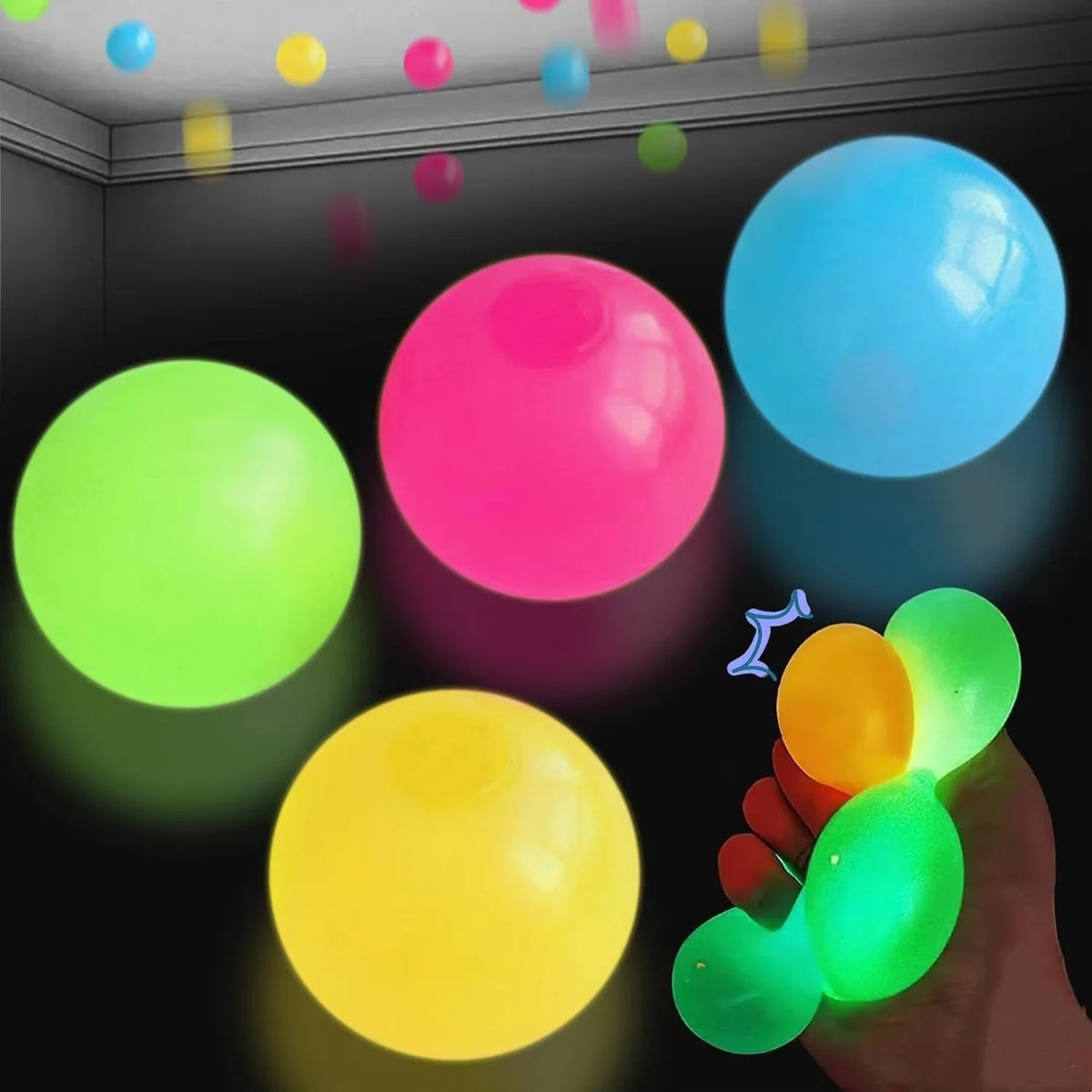 Glow-in-the-dark sticky balls, hand holding green and orange spheres among colorful others
