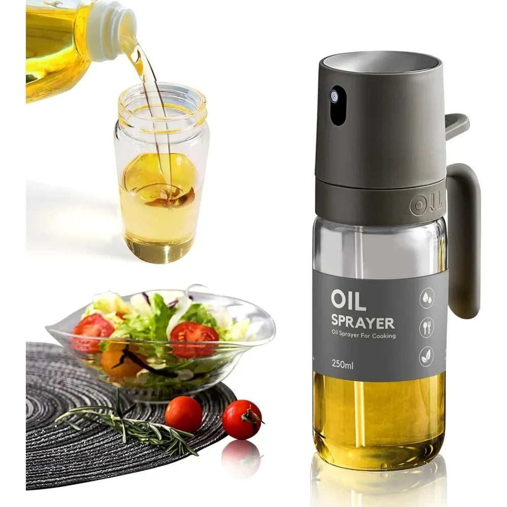 Oil sprayer bottle with clear glass body and gray top; oil poured from sprout into jar