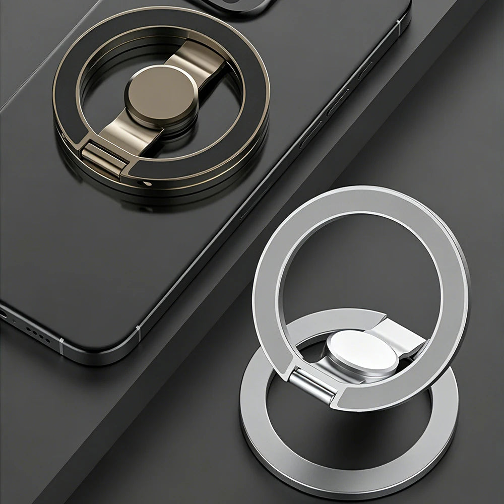 Silver magnetic ring and suction base attached to dark phone, circular rotatable holder