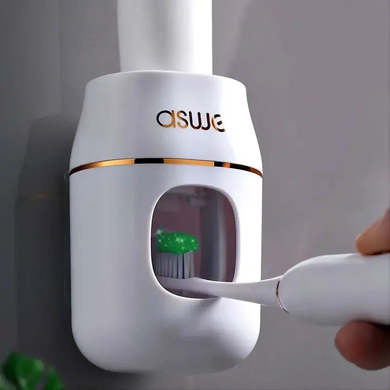 White automatic wall-mounted toothpaste dispenser with nozzle dispensing through front window