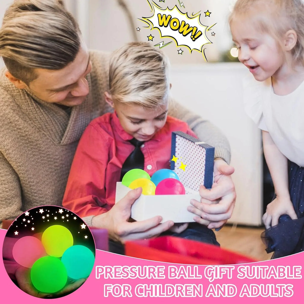 Glow-in-the-dark pressure ball gift box with colorful ball icon