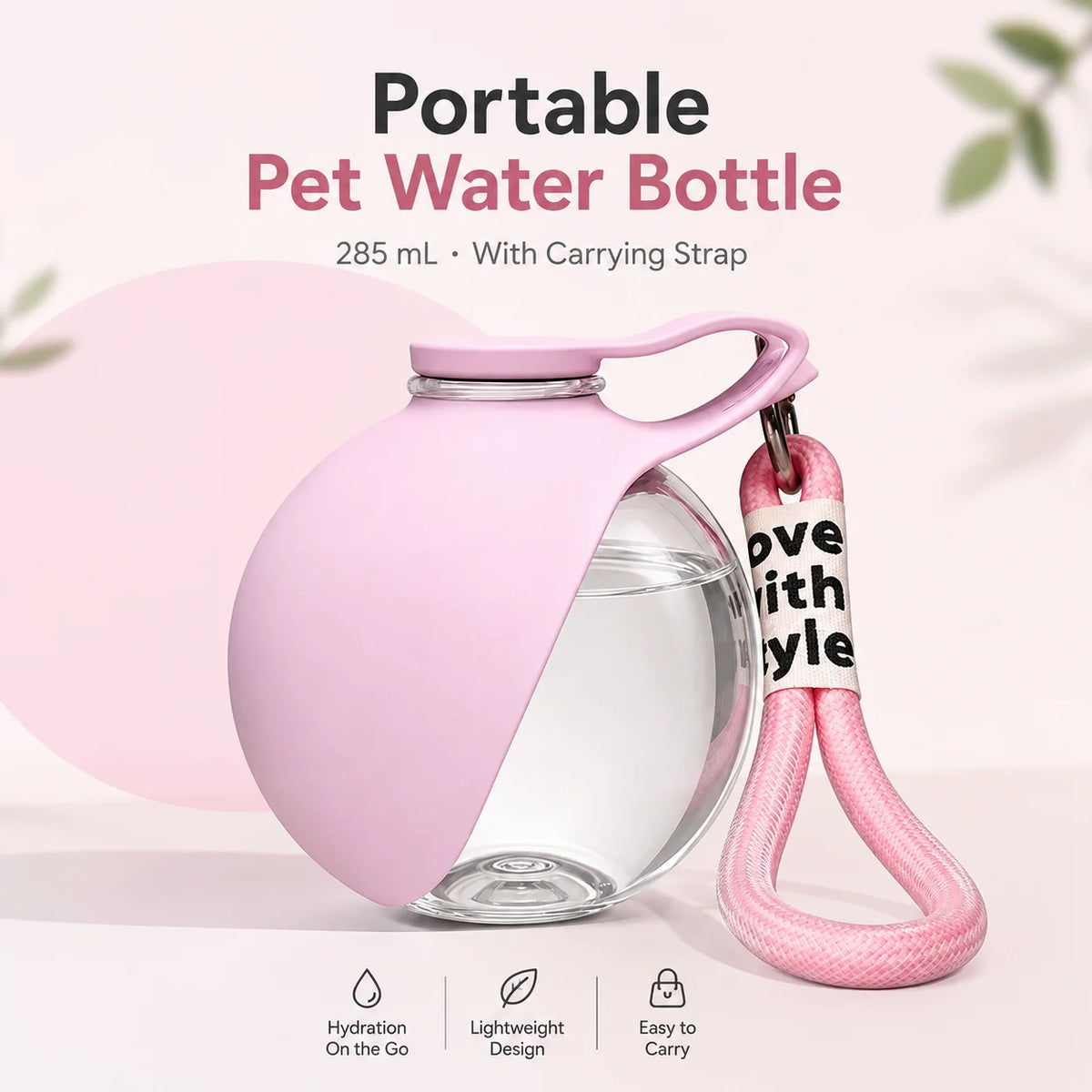Pink portable pet water bottle with clear cup and carrying strap, leak-proof design
