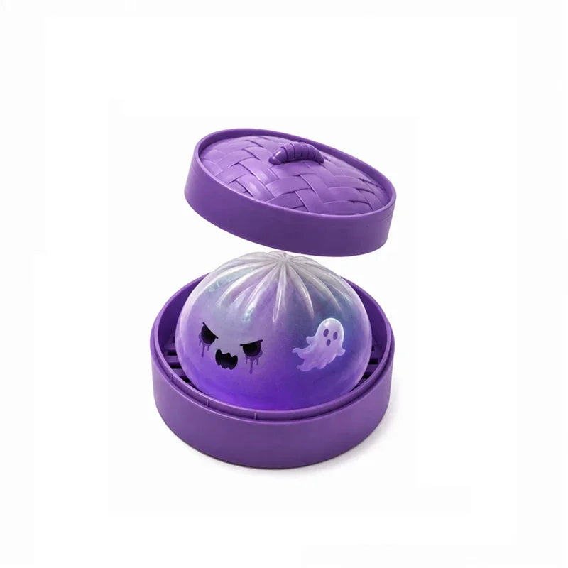 Purple ghost dumpling stress ball in purple steamer-style container