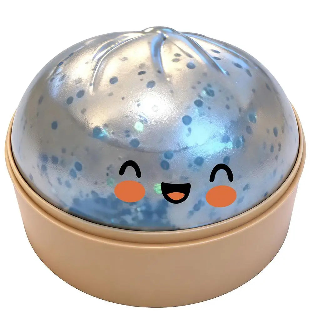 Silver-blue glitter squishy bun stress ball in beige round case, happy cartoon face