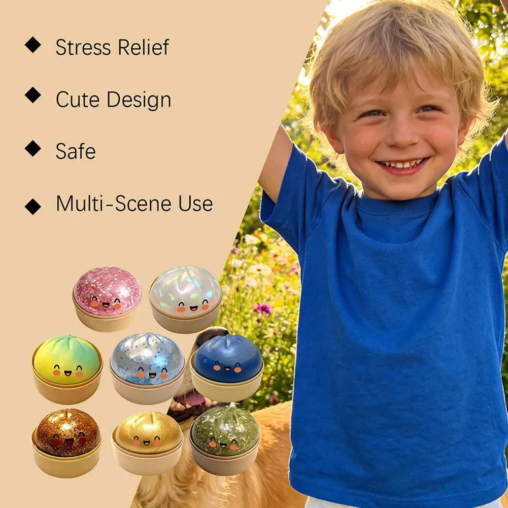 Colorful bun-shaped squishy stress balls with cute faces, glitter domes in gold bases