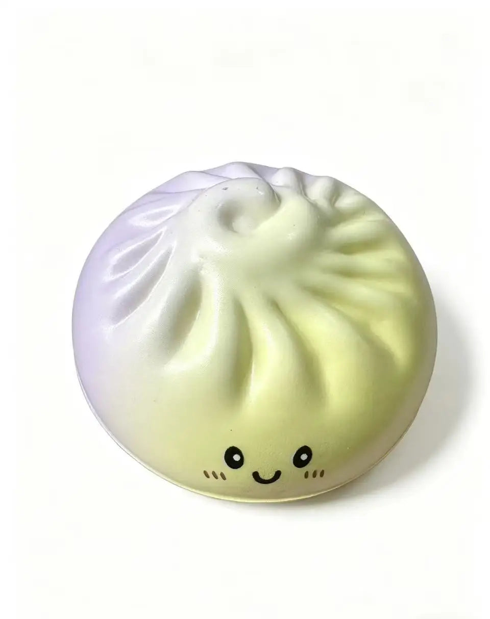 Cream-yellow dumpling squishy toy with smiling face and steamer-bun ridges
