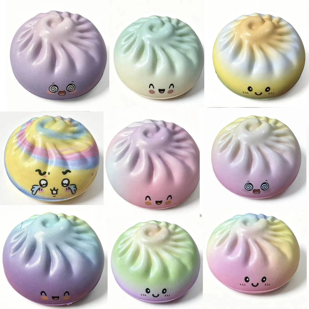 Assorted pastel dumpling squishy toys with cute faces and ridged tops