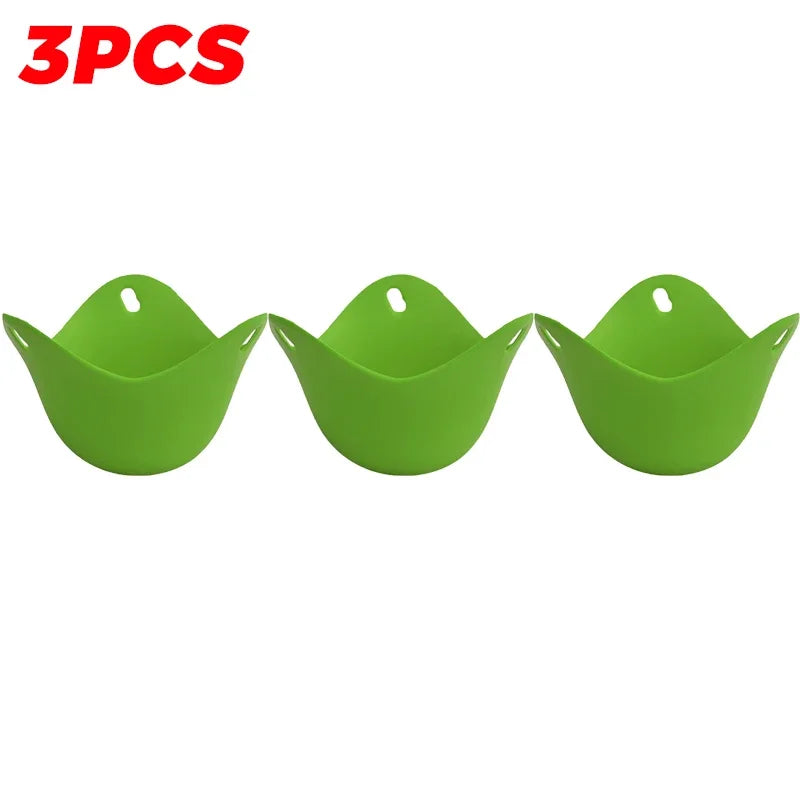 Green silicone egg poacher cup set of three with center holes for cooking eggs
