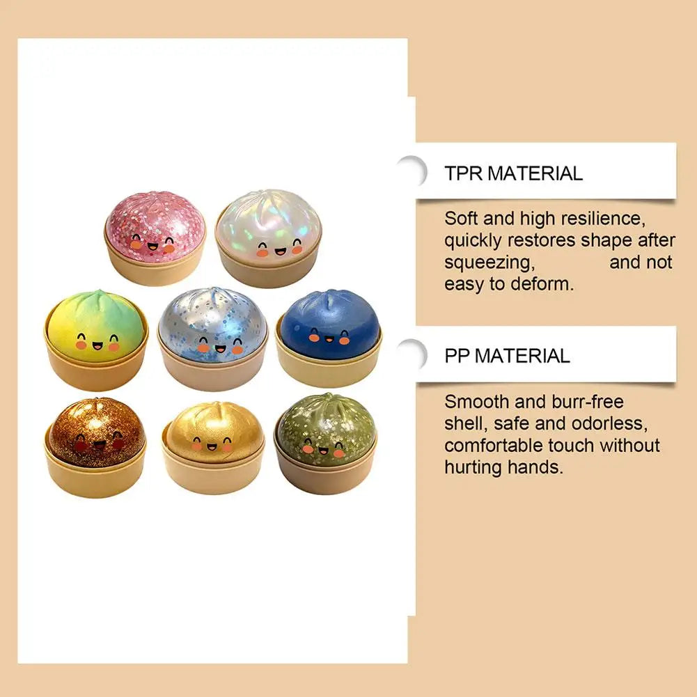 Assorted bun-shaped squishy stress balls, glitter domes and cute faces on gold bases