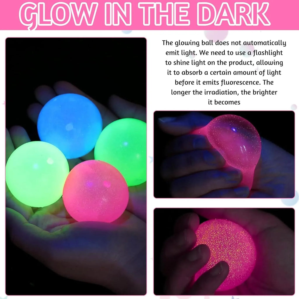 Glow-in-the-dark sticky balls in blue, green, and pink with close-up hands