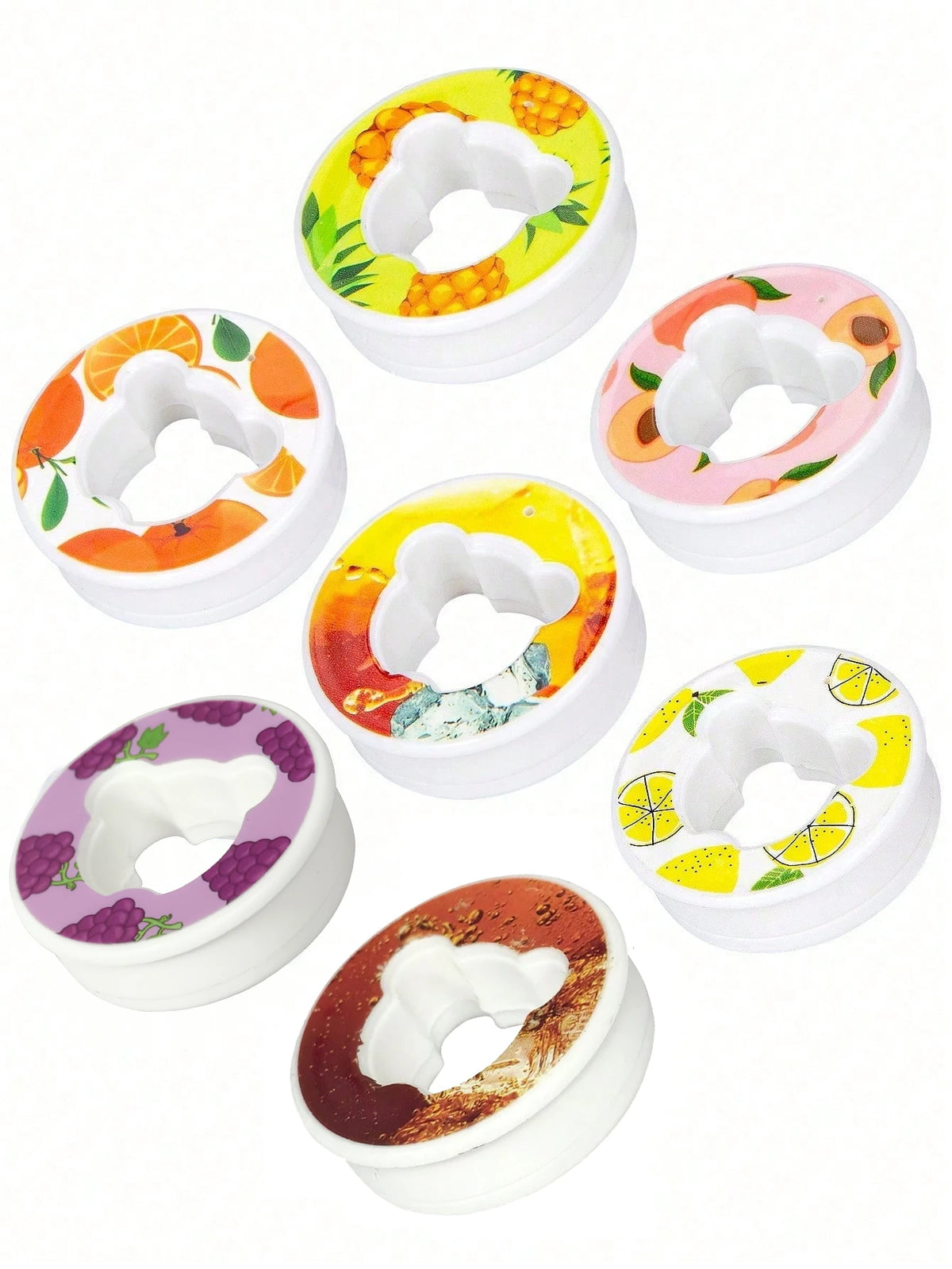 Assorted random flavor pod inserts with fruit pattern and white base caps