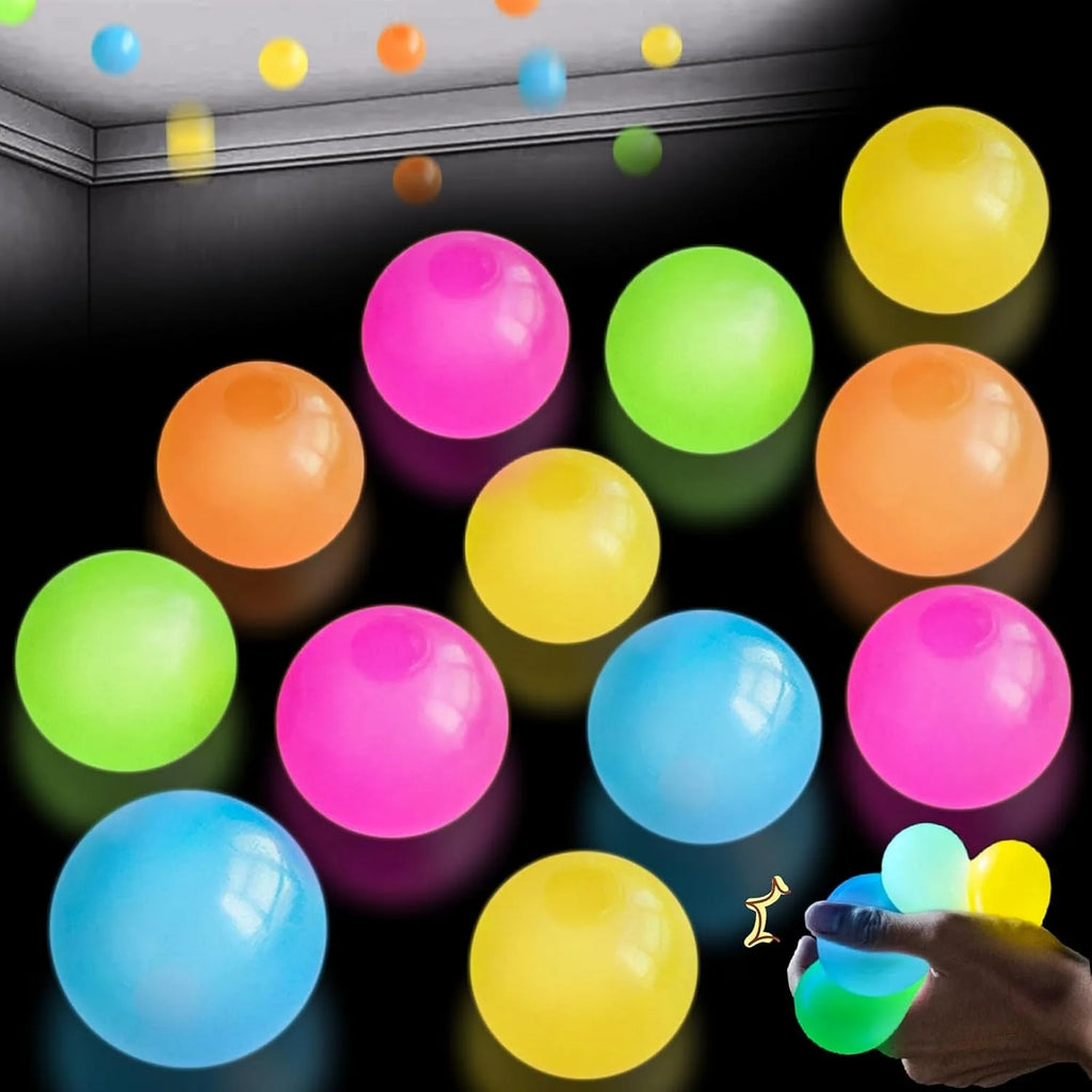 Set of glow-in-the-dark sticky squishy balls in assorted bright colors, shown together