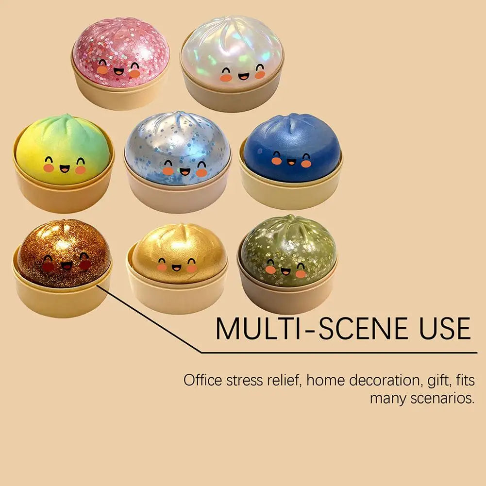 Seven bun squishy stress balls with cute faces on gold bases, multi-color domes