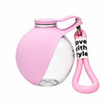 Pink pet water dispenser bottle with hinged clear drinking cup and handle strap