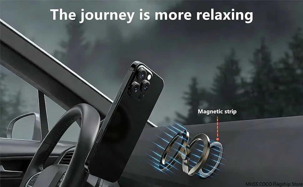 Magnetic phone holder with rotating ring mounted near a car dashboard