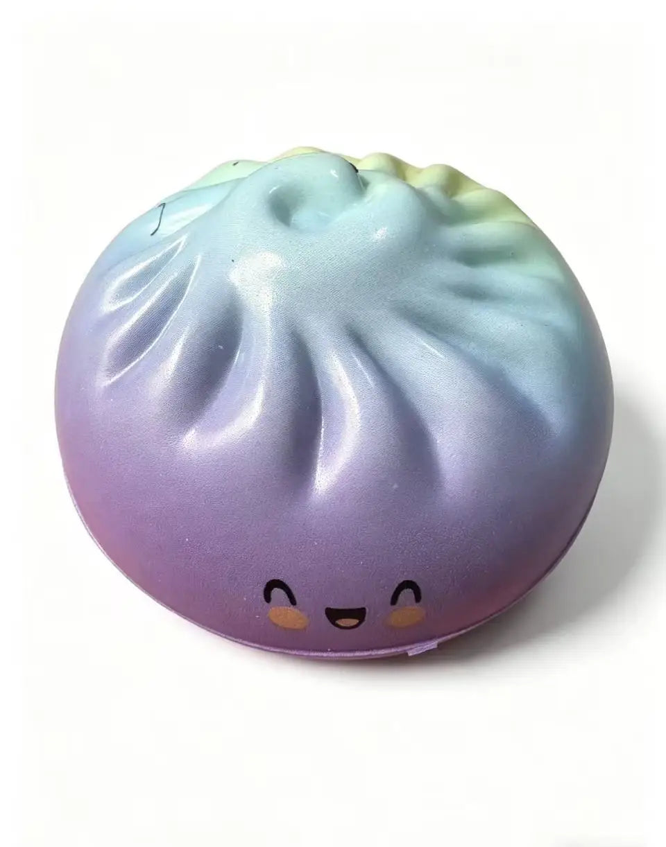 Pastel dumpling squishy toy with ribbed steamed top and closed-mouth smile.