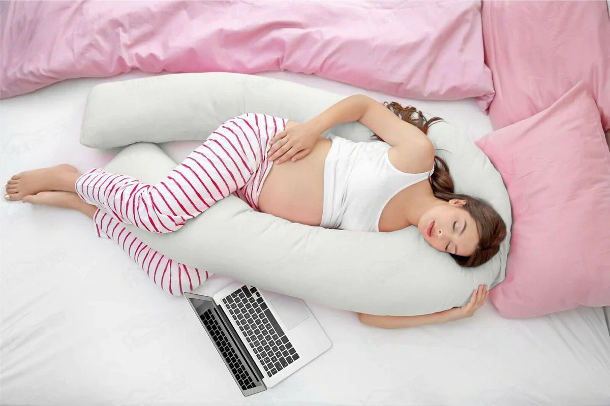 Light grey U-shaped sleep therapy pillow for side sleeping support