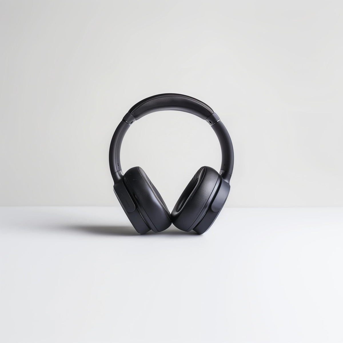 Black over-ear headphones with padded earcups and adjustable headband